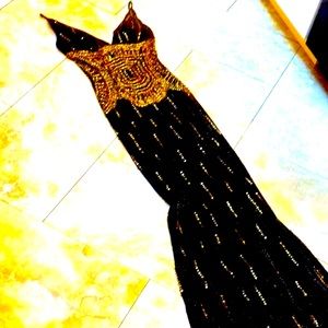 - Unique eye catching Cache evening gown